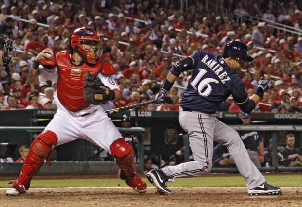 Molina guns down another runner